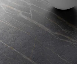 CouchtischCasilda 150x90 cm Keramik Laminam®Noir Desir Braun Mittelfuß Effektfinish Titan Sofort versandfertig