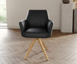 DrehstuhlXana-Flex mit Armlehnen Echt-Leder Schwarz Holzgestell kantig Natur 360° drehbar Taschenfederkern Versandfertig ca. 28.10.26